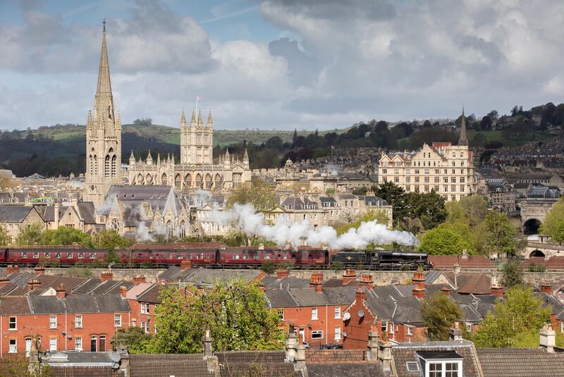 A historic  'Black Five steam locomotive hauls a ten-carriage train out of Bath Spa Railway Station on April 26, 2018 in Bath, England, UK. Matt Cardy / Getty Images