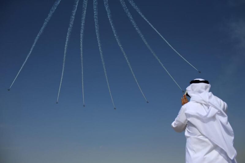 The Al Fursan aerobatic squad thrilled visitors on Sunday at the opening of Dubai Air Show, the biggest aerospace event in the Middle East, Asia and Africa. Jasper Juinen / Bloomberg