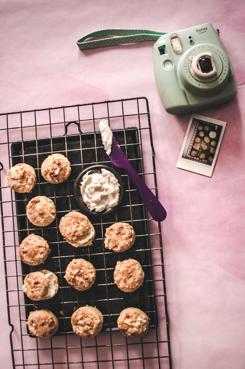 Get your kids to prepare and photograph simple dishes, such as these mini cheese scones, and create their own cookbook or food magazine. Photo: Scott Price