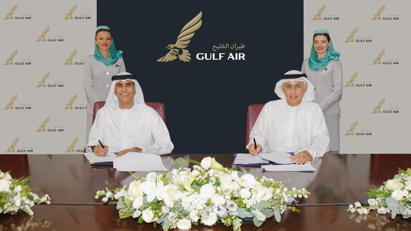 Sheikh Salem bin Sultan, chairman of Ras Al Khaimah International Airport, and Zayed Alzayani, chairman of Gulf Air's board, sign the agreement that will expand air travel options for Northern Emirates. Photo: Gulf Air