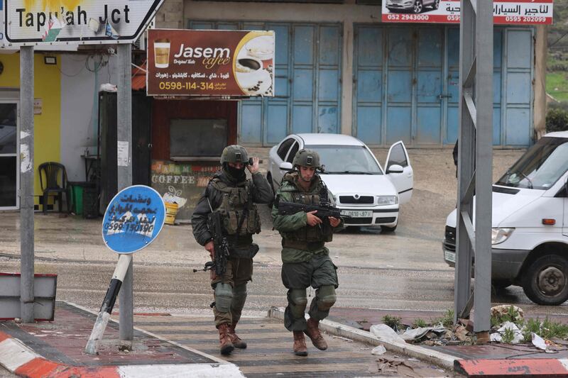 Israeli soldiers patrol Huwara in the occupied West Bank as fears rise of increased clashes. AFP