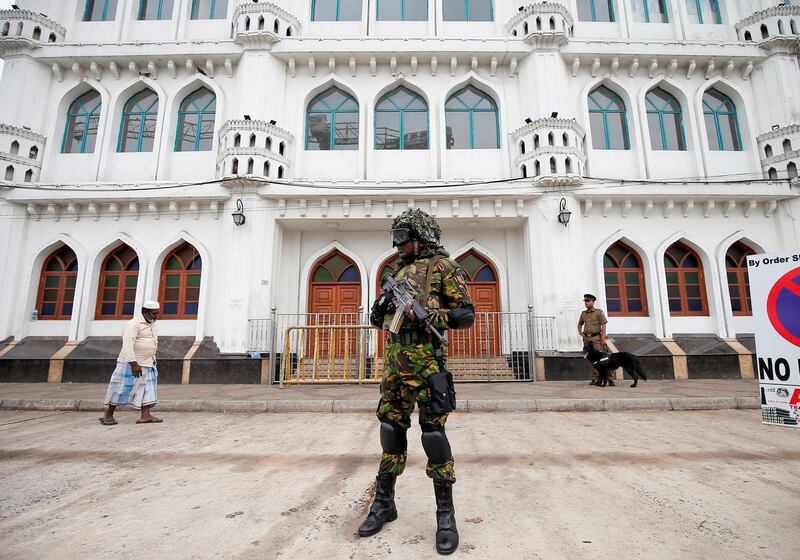 Special Task Force soldiers stand guard in front of a mosque in Colombo. Reuters