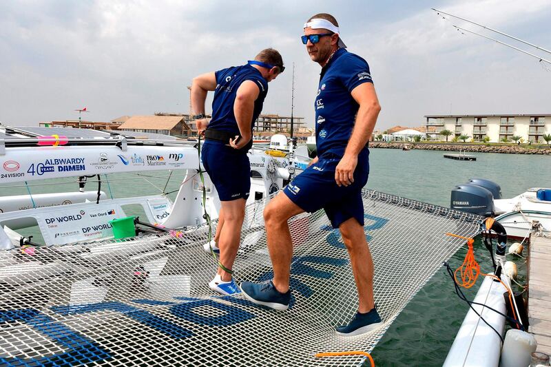 English rower Matt Wilds and a teammate check the last details before leaving Dakar. AFP