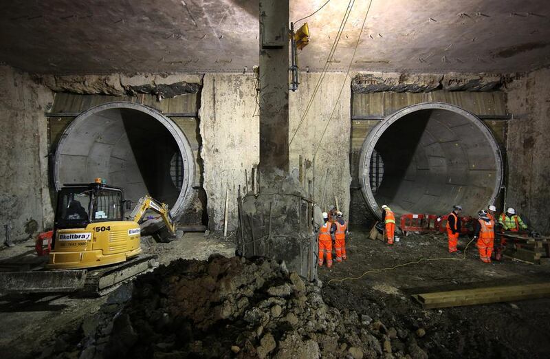 Workers prepare the rail tunnels at the new Crossrail station at Paddington. Peter Macdiarmid / Getty Images
