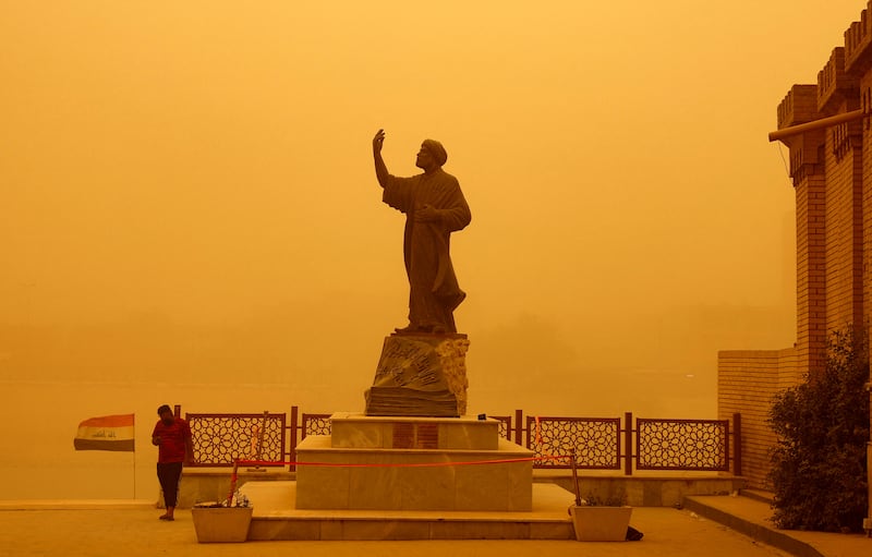 A statue of Arab poet Al-Mutanabbi during a sandstorm in Baghdad. Reuters
