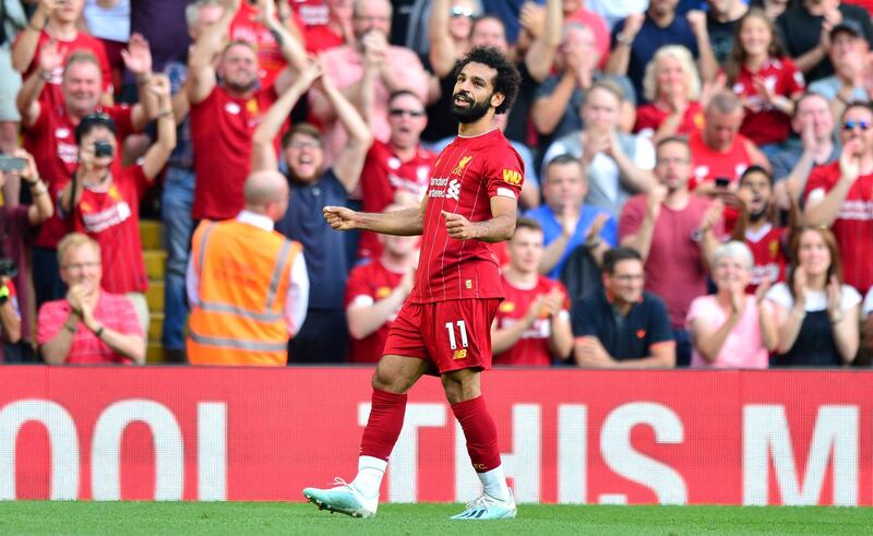 Liverpool's Mohamed Salah celebrates the second of his two goals in the 3-1 win over Arsenal on Saturday. PA Photo