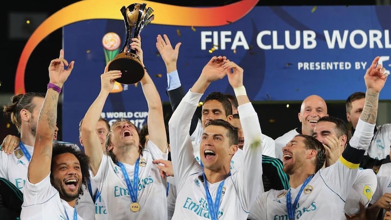 Cristiano Ronaldo, centre, celebrates with his Real Madrid teammates after winning the 2017 Fifa Club World Cup. Tickets for the 2018 tournament, again in the UAE, with Madrid back to defend their title, are now on sale. Karim Sahib / AFP