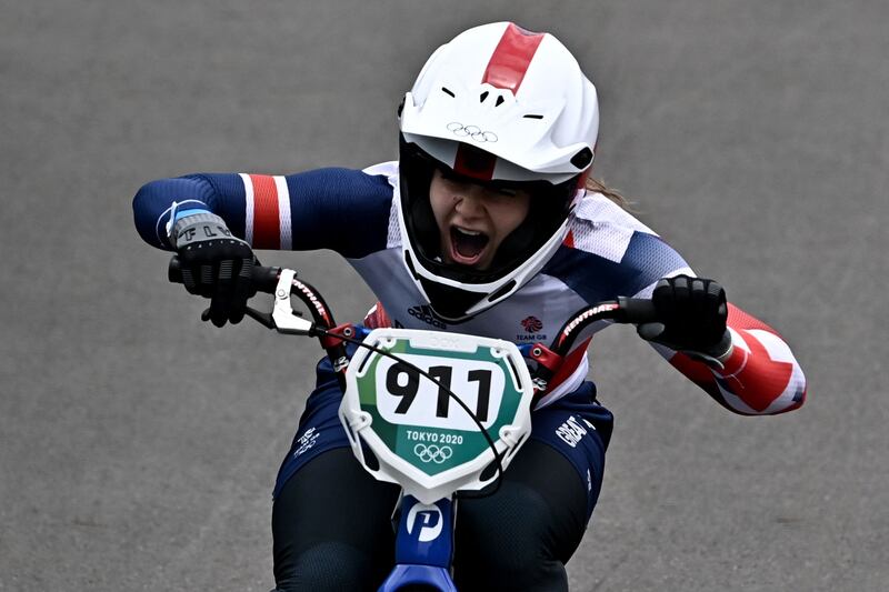Britain's Bethany Shriever celebrates after winning the cycling BMX racing women's final.