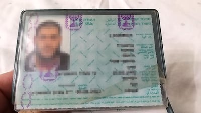 The Israeli identification document of Mohammed Khalid, provided by his family. The National