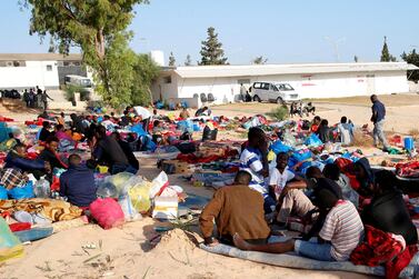 Migrants gather outside the detention centre in Tajoura, a suburb of Tripoli, Libya, on July 7, 2019, four days after it was hit by an air strike. Reuters