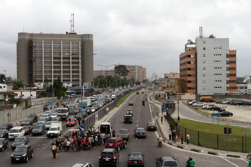 Traffic passes through the Lagos-Epe express road,leading to the free trade zone in Nigeria's commercial capital Lagos July 14,2012.  Akintunde Akinleye for The National
