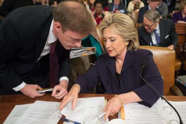 Former Secretary of State and Democratic presidential candidate Hillary Clinton (R) speaks with former Clinton staff member at the State Department, Jake Sullivan (L), during a break from testifying at the House Select Committee on Benghazi, on Capitol Hill in Washington DC, USA, 22 October 2015. EPA