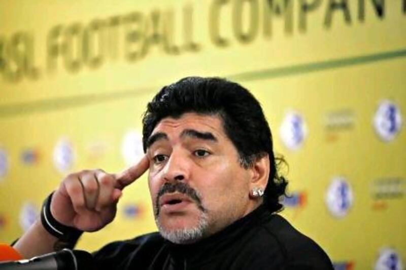 Diego Maradona says goalkeeper Majed Nasser will continue to train with the squad as they appeal his 17-match ban. Jeff Topping / The National