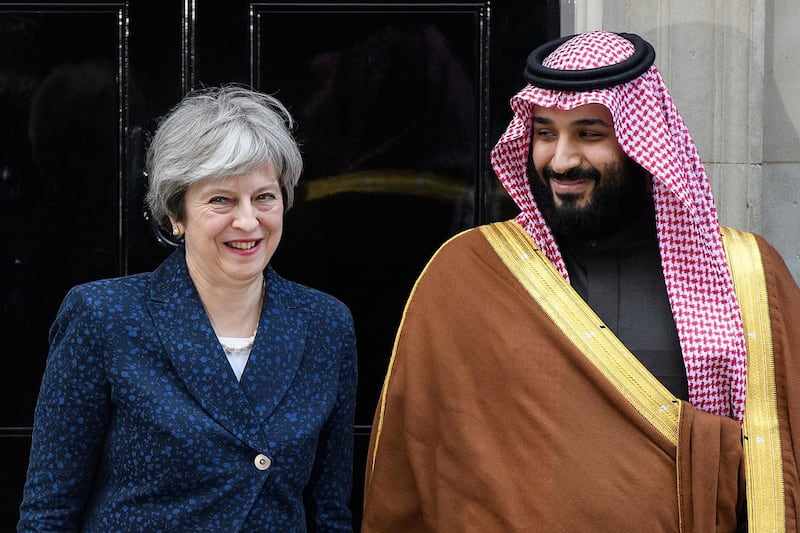 LONDON, ENGLAND - MARCH 07:  British Prime Minister Theresa May (L) stands with Saudi Crown Prince Mohammed bin Salman on the steps of number 10 Downing Street on March 7, 2018 in London, England. Saudi Crown Prince Mohammed bin Salman has made wide-ranging changes at home supporting a more liberal Islam. Whilst visiting the UK he will meet with several members of the Royal family and the Prime Minister.  (Photo by Leon Neal/Getty Images)