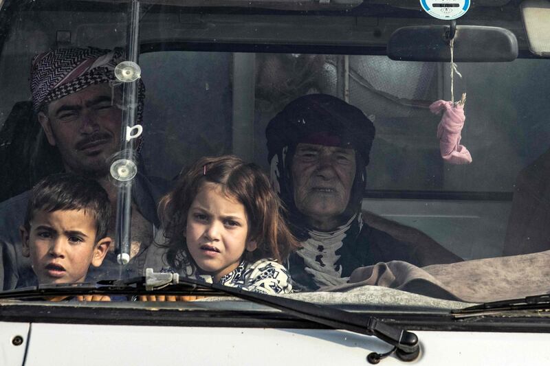 Syrian Kurds flee Ras Al Ain. AFP