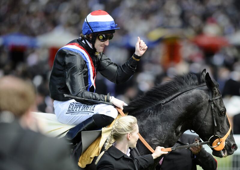 Pat Cosgrave riding Society Rock to win The Golden Jubilee Stakes on June 18, 2011 in Ascot, England. Alan Crowhurst / Getty Images