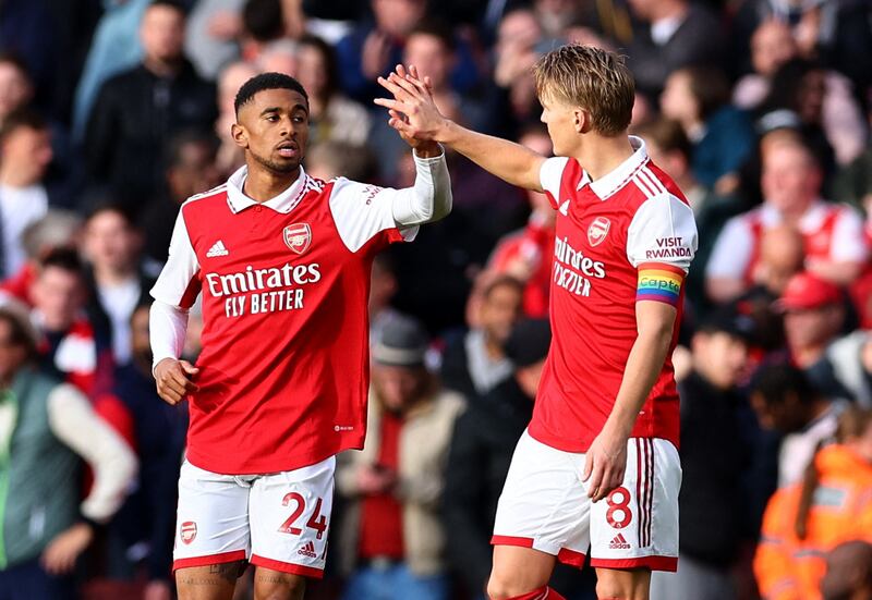 Reiss Nelson celebrates scoring their second goal with Martin Odegaard. Reuters