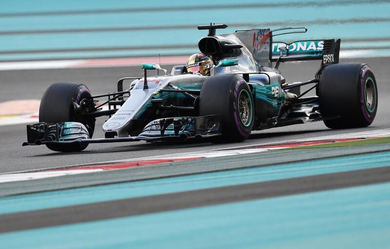 Mercedes driver Lewis Hamilton steers his car during the Abu Dhabi Grand Prix. Andrej Isakovic / AFP