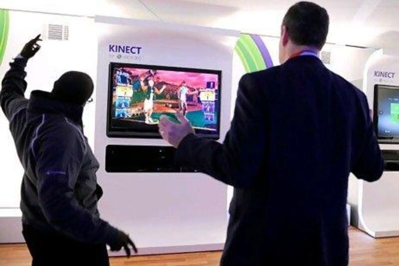 Microsoft's Kinect last year became the fastest-selling consumer electronics device, outstripping even the Apple iPhone. David Becker / Getty Images / AFP