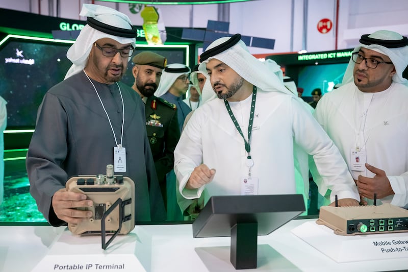 President Sheikh Mohamed visits a booth at Idex