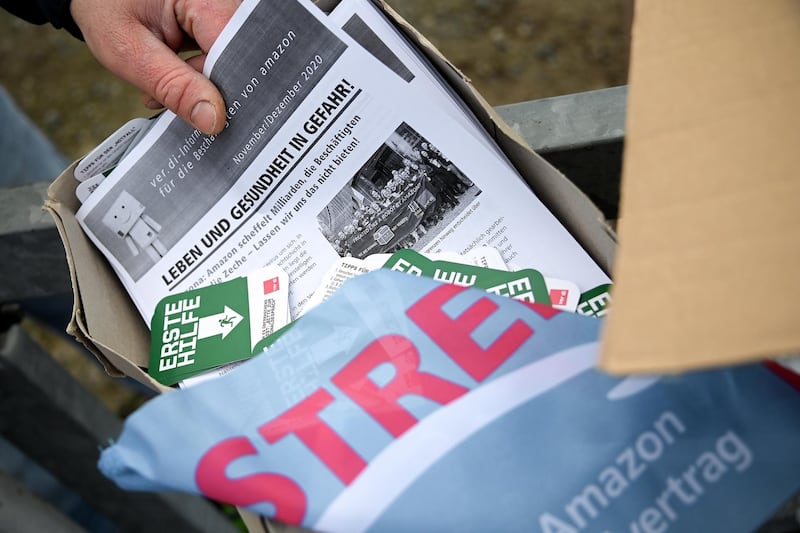 Flyers featuring information on the strike in a parking lot near the Amazon logistic center in Rheinberg. EPA
