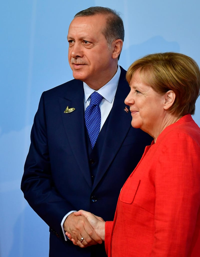 Mrs Merkel with Turkish president Recip Tayyip Erdogan. Tobias Schwarz / AFP Photo