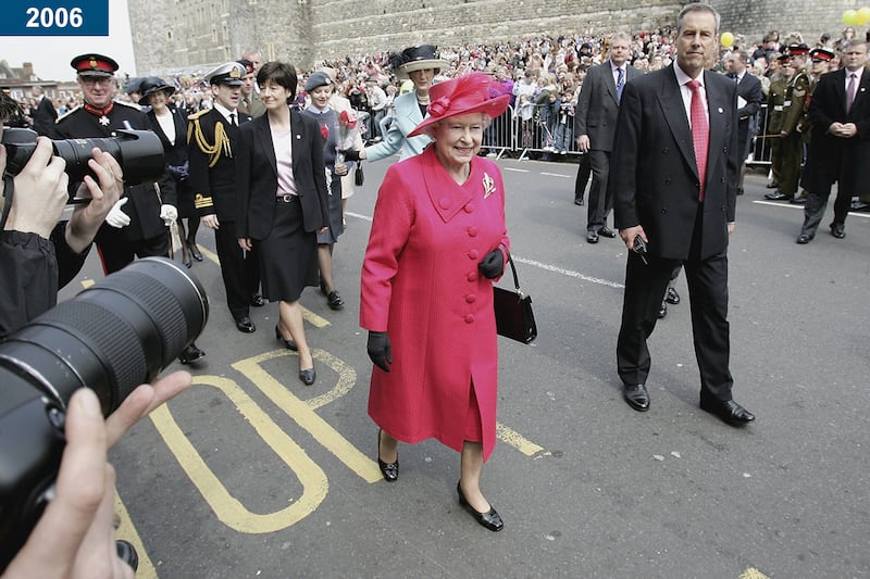 2006: The queen smiles at the crowds in Windsor, during a walk in the town to celebrate her 80th Birthday.