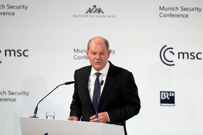 Germany's Chancellor Olaf Scholz gives a speech. AP
