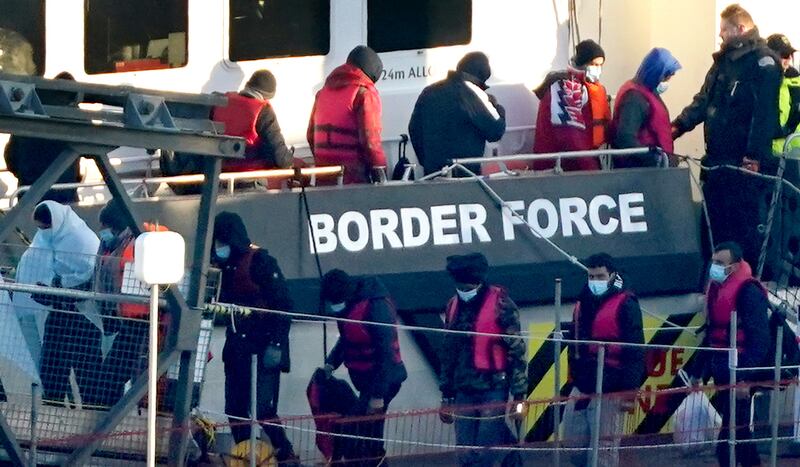 Migrants are taken in to Dover, Kent, on a Border Force vessel after being rescued from a small boat on the English Channel in February. PA