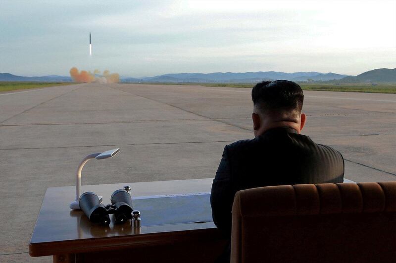 FILE PHOTO: North Korean leader Kim Jong Un watches the launch of a Hwasong-12 missile in this undated photo released by North Korea's Korean Central News Agency (KCNA) on September 16, 2017. KCNA via REUTERS/File Photo   ATTENTION EDITORS - THIS PICTURE WAS PROVIDED BY A THIRD PARTY. REUTERS IS UNABLE TO INDEPENDENTLY VERIFY THE AUTHENTICITY, CONTENT, LOCATION OR DATE OF THIS IMAGE. NO THIRD PARTY SALES. SOUTH KOREA OUT