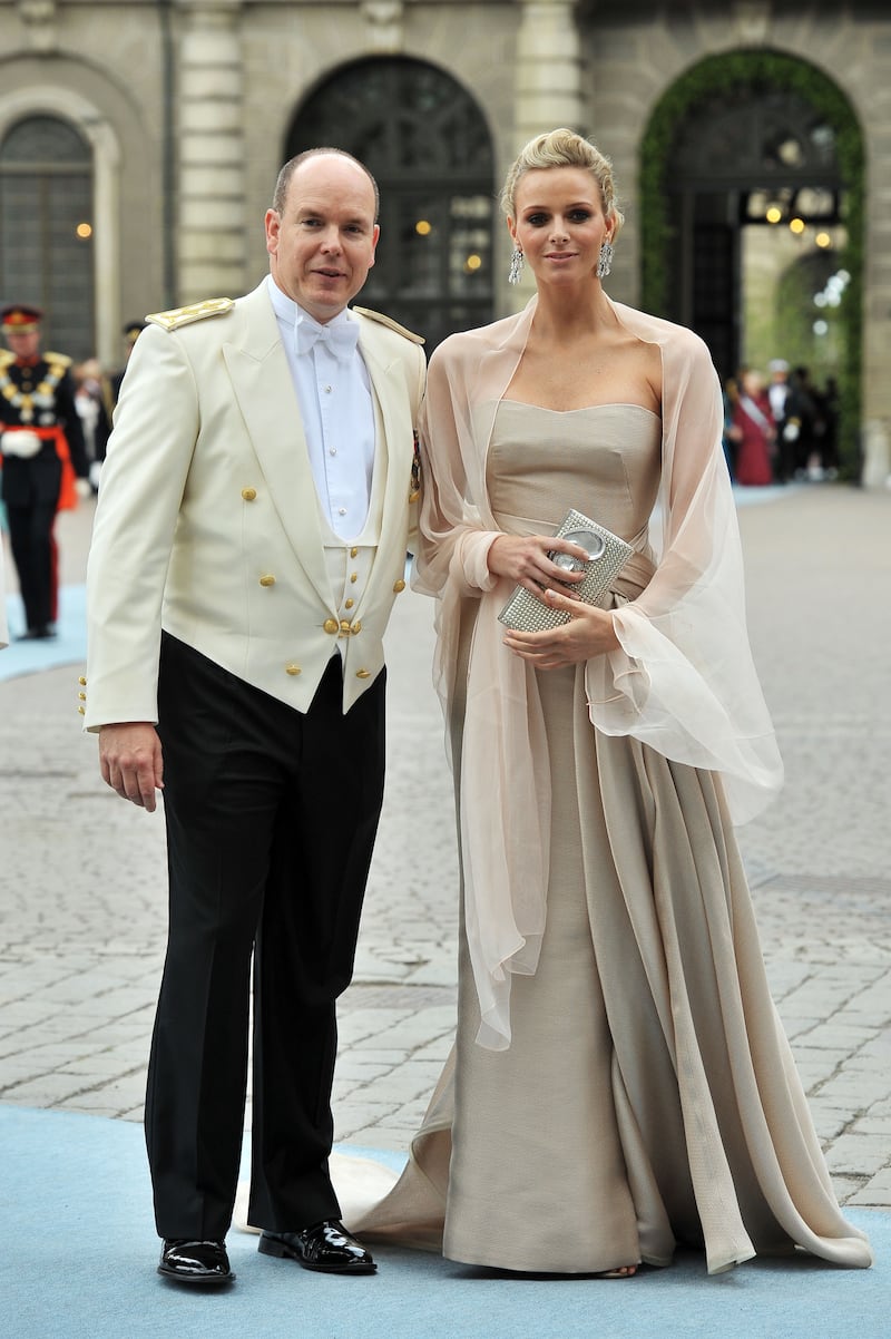 Prince Albert of Monaco and Charlene Wittstock, in a taupe gown, attend the wedding of Crown Princess Victoria of Sweden and Daniel Westling on June 19, 2010 in Stockholm, Sweden. Getty Images