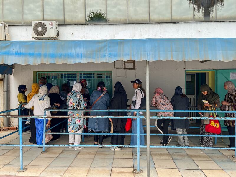 Patients queue outside a pharmacy in Tunis. Ghaya Ben Mbarek /  The National