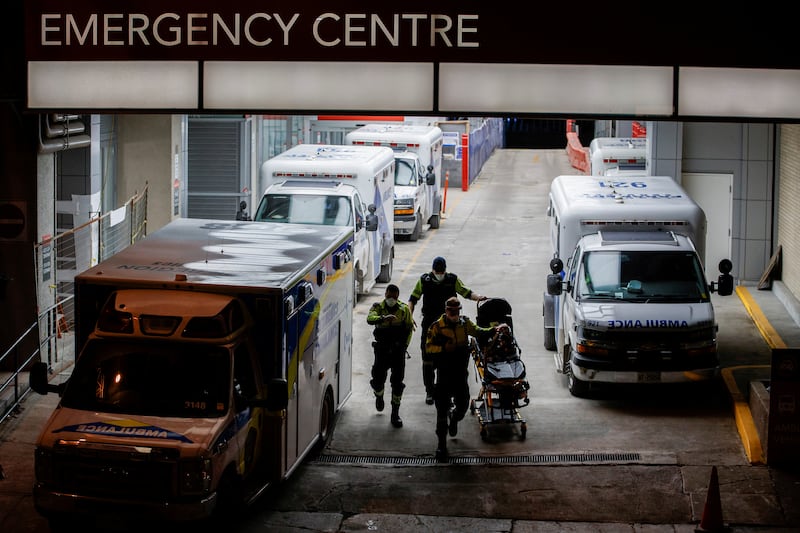 A patient is delivered to Mount Sinai Hospital in Toronto amid fears of a wave  of coronavirus cases in Canada. Reuters