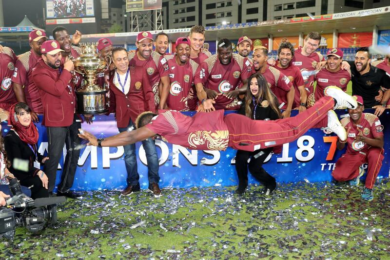 Sharjah, United Arab Emirates - December 02, 2018: Warriors celebrates winning the trophy after the game between between Pakhtoons and Northern Warriors in the T10 final. Sunday the 2nd of December 2018 at Sharjah cricket stadium, Sharjah. Chris Whiteoak / The National