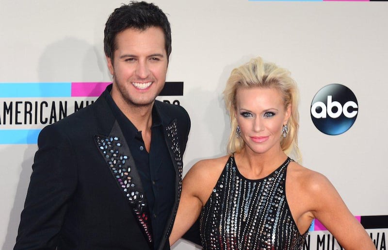 Country music singer Luke Bryan and Caroline Bryan arrive for the 2013 American Music Awards at the Nokia Theatre. Frederic J. Brown / AFP Photo