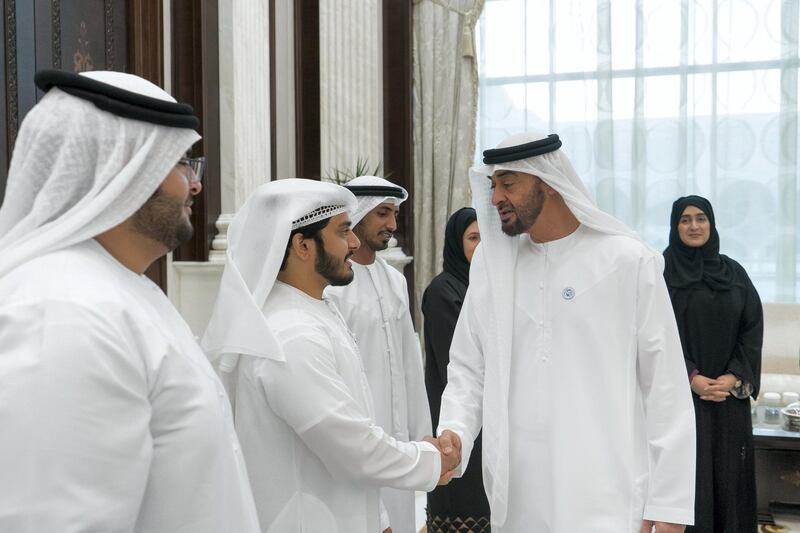 ABU DHABI, UNITED ARAB EMIRATES - June 12, 2018: HH Sheikh Mohamed bin Zayed Al Nahyan Crown Prince of Abu Dhabi Deputy Supreme Commander of the UAE Armed Forces (R) receives State Audit Institution employees, during an iftar reception.
( Rashed Al Mansoori / Crown Prince Court - Abu Dhabi )
---