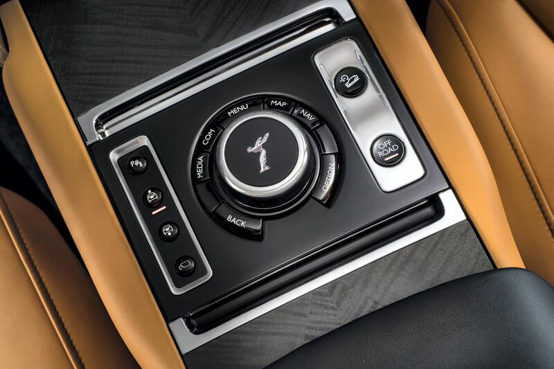 The Cullinan's centre console features a button that reads 'off road'.