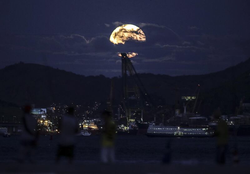 A view of the super moon in Rio de Janeiro, Brazil. Antonio Lacerda / EPA.