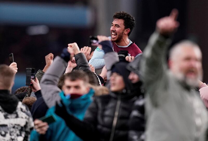 Trezeguet celebrates after the match with Aston Villa fans. Reuters