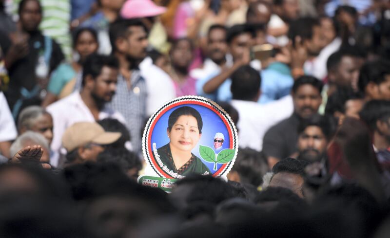 Indian supporters gather to pay their respects to the Tamil Nadu Chief Minister Jayalalithaa Jayaram as she lies in state ahead of her funeral at Rajaji Hall in Chennai on December 6, 2016.
Grief-stricken fans on December 6 mourned the death of one of India's most popular politicians, Jayalalithaa Jayaram, as fears of unrest loomed in her state where she enjoyed almost god-like status. / AFP PHOTO / ARUN SANKAR