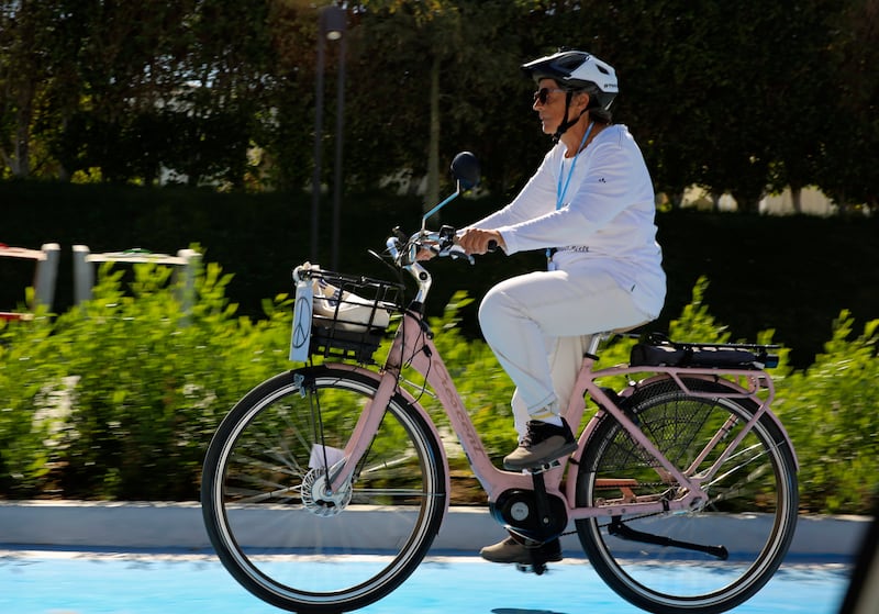 Dorothee Hildebrandt, 72, on her e-bike in Sharm El Sheikh. AP