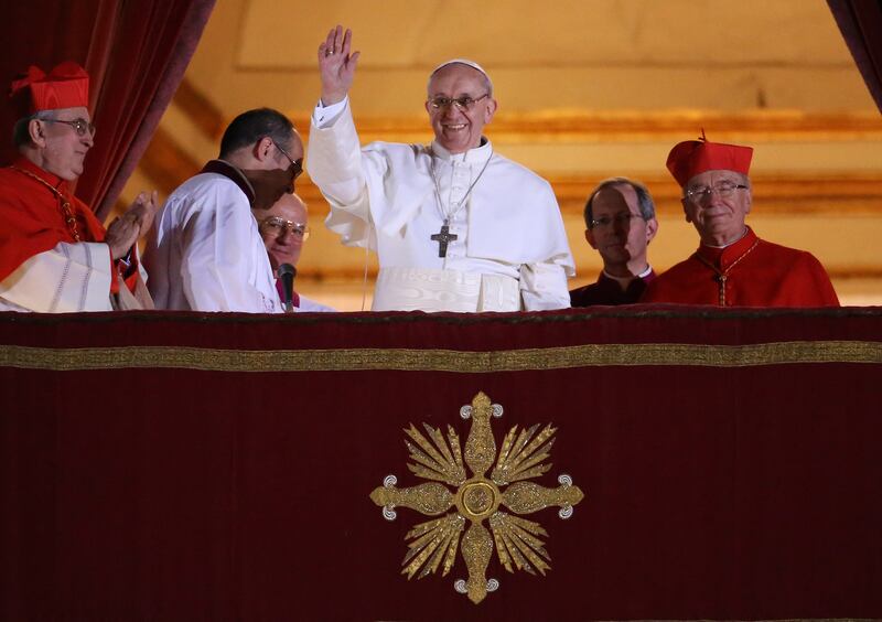 Pope Francis on the central balcony of St Peter's Basilica in March 2013. Getty Images