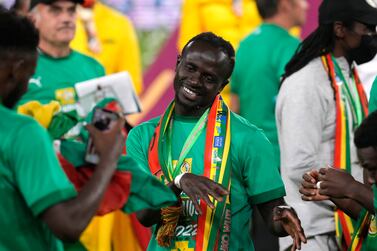 Senegal's Sadio Mane dances as they celebrate after winning the African Cup of Nations 2022 final soccer match against Egypt at the Olembe stadium in Yaounde, Cameroon, Sunday, Feb.  6, 2022.  (AP Photo / Themba Hadebe)