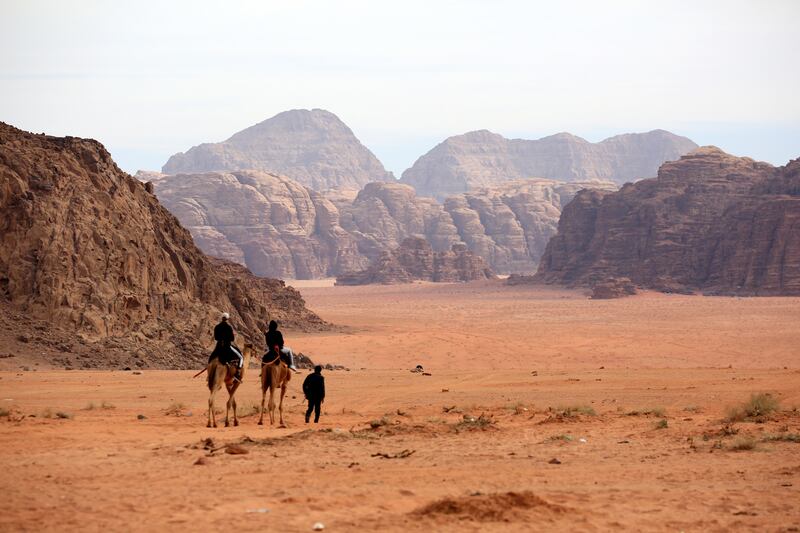 The desert has been inhabited by many cultures including the Nabateans who left paintings and writings on some of the rocks. Photo: EPA-EFE