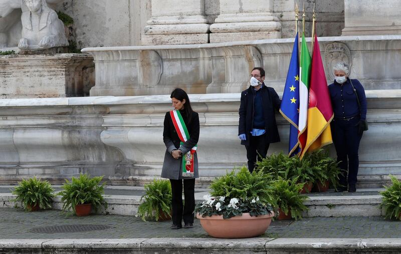 Mayor of Rome Virginia Raggi attends a memorial ceremony as mayors across Italy stand in silence to honour the country's dead due to coronavirus disease (COVID-19), in Rome, Italy, March 31, 2020. REUTERS/Remo Casilli