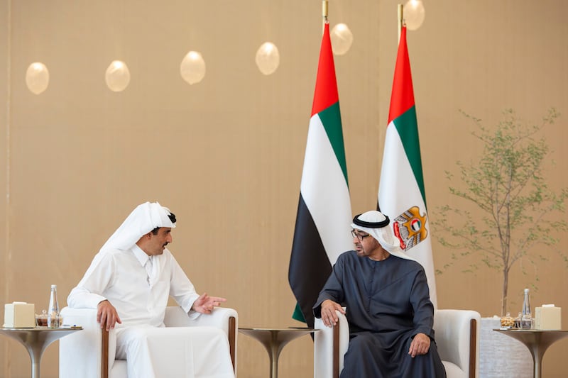 President Sheikh Mohamed meets Sheikh Tamim, Emir of Qatar, at the Presidential Airport. Photo: Ryan Carter / UAE Presidential Court