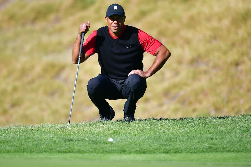 Tiger Woods lines his putt on the fourth green during the final round of The Genesis Invitational at Pacific Palisades, California, USA. Reuters