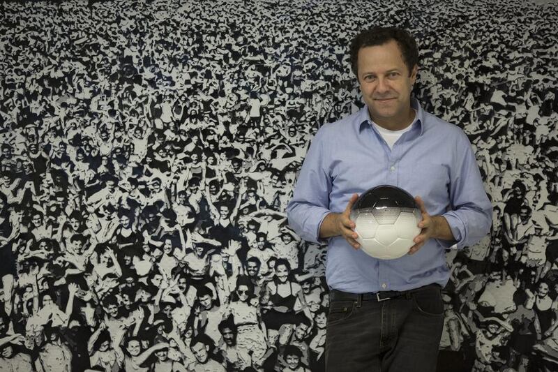 Brazilian artist Vik Muniz at his studio in Rio de Janeiro, Brazil. Muniz is making his directorial debut with This Is Not a Ball, a documentary that chronicles his quest to 'draw' with soccer balls. (AP Photo/Felipe Dana)