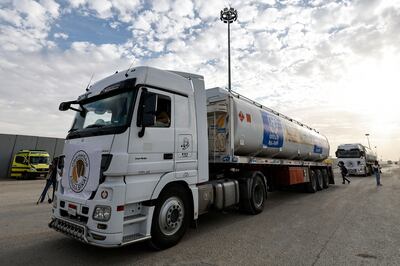UNRWA fuel lorries at the Egyptian side of the Rafah border crossing last year. AFP