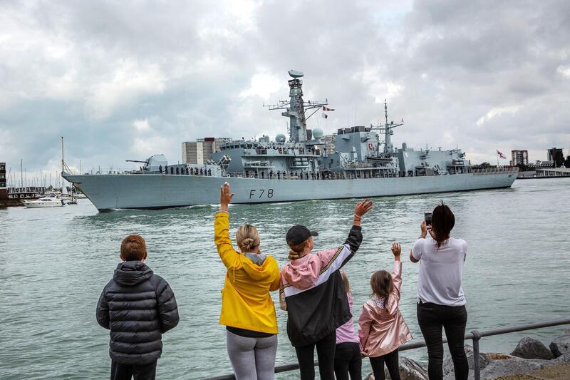 PORTSMOUTH, ENGLAND - AUGUST 12: Families wave as HMS Kent, a Type 23 frigate leaves Portsmouth Harbour on August 12, 2019 in Portsmouth, England. The British warship is on route to the Gulf amid heightened tensions with Iran. (Photo by Dan Kitwood/Getty Images)